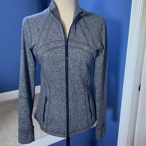 New without tags Secure front pockets, back vent